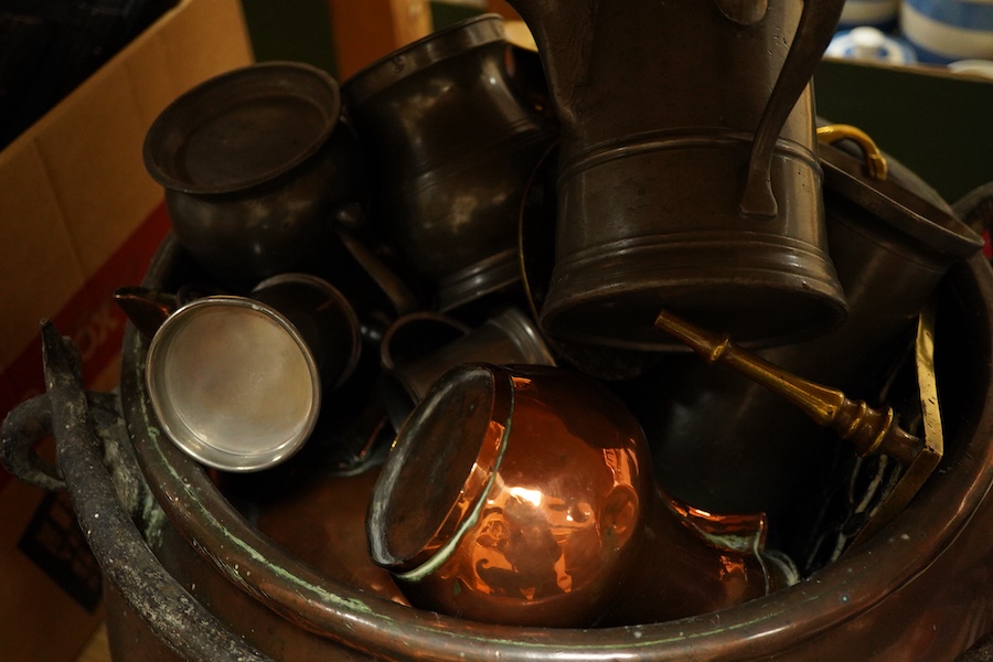 A collection of mixed pewter copper and brass